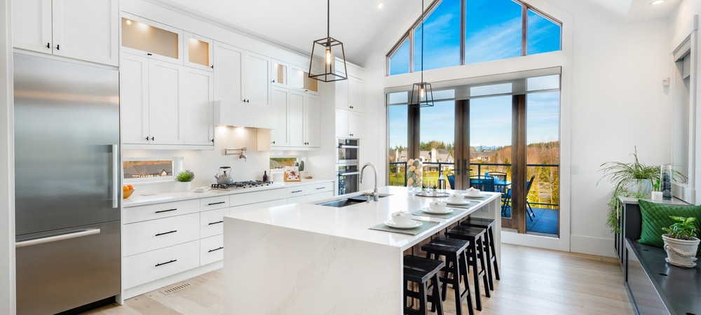 Contemporary kitchen with integrated LED cabinet lighting